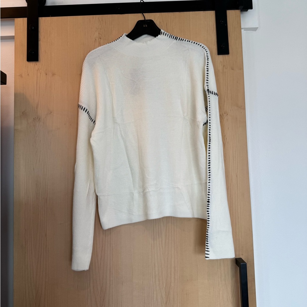 Elegant White Sweater with Black Accents